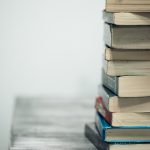 a lot of books on the table