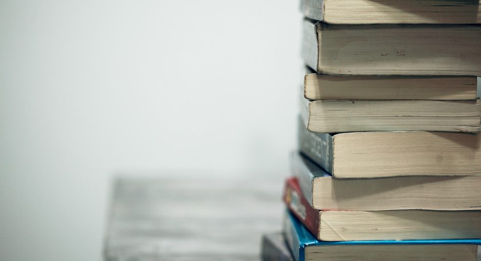 a lot of books on the table