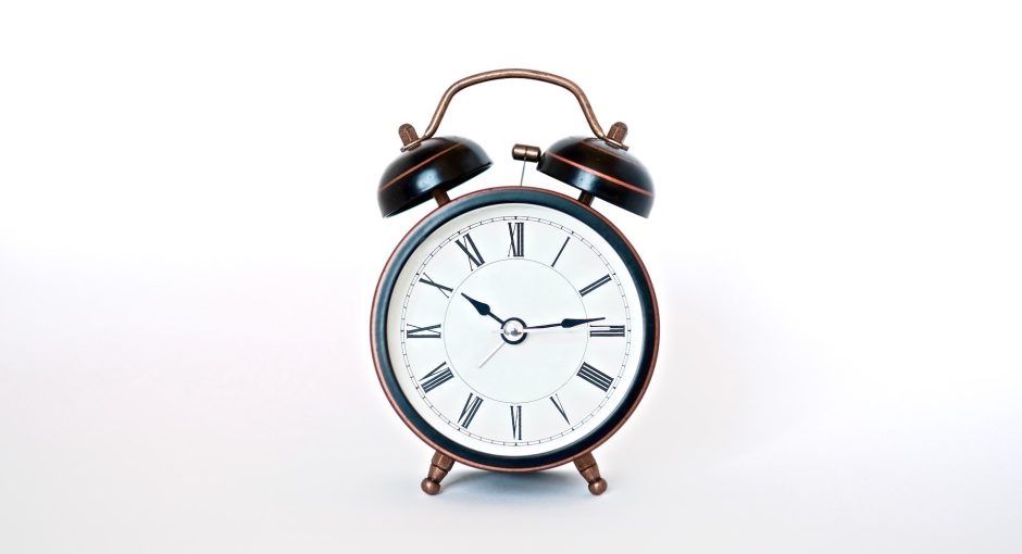 clock on white surface