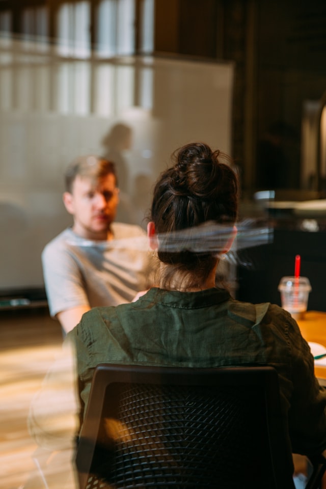 person consulting by mentor